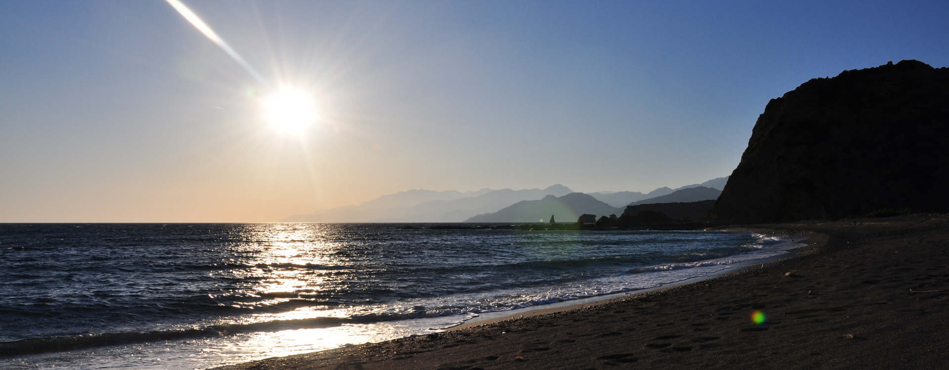 Wild beach at sunset over the dune from Yoga Rocks retreats Crete