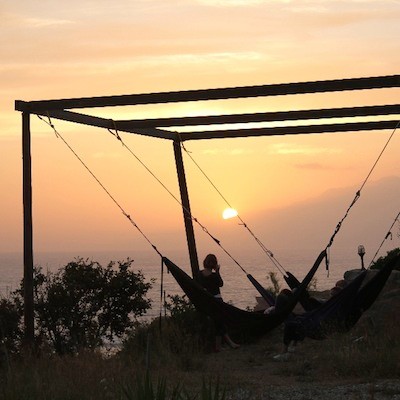 hammocks and yoga rocks sunset crete