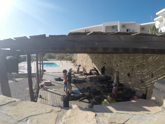 Yoga Retreat headstand leading to relaxation