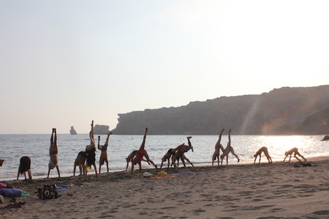 Beach yoga class with Simon Park