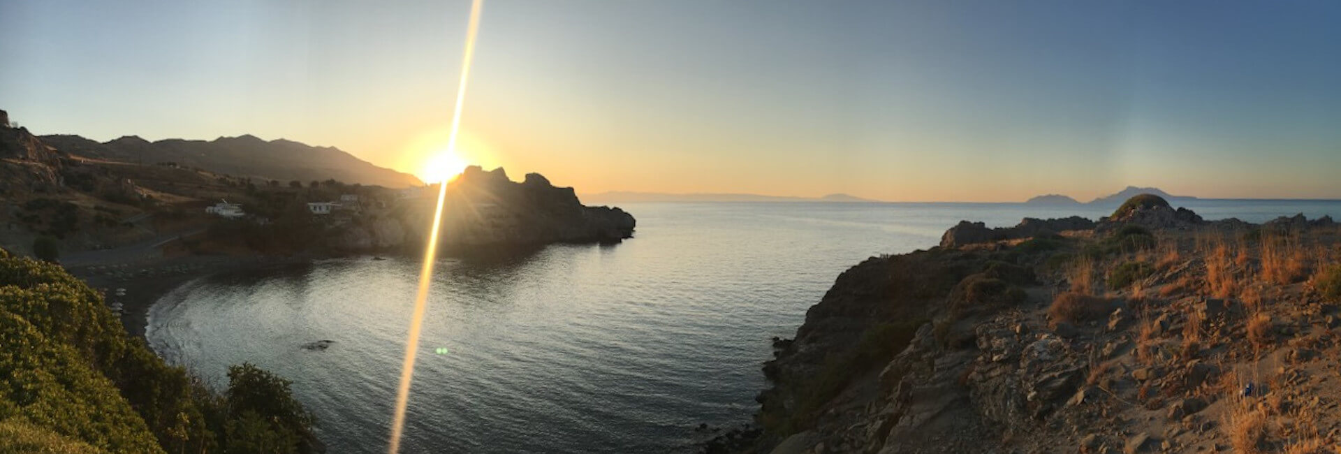 Dawn rising over Agios Pavlos bay with Yoga Rocks yoga holidays Greece