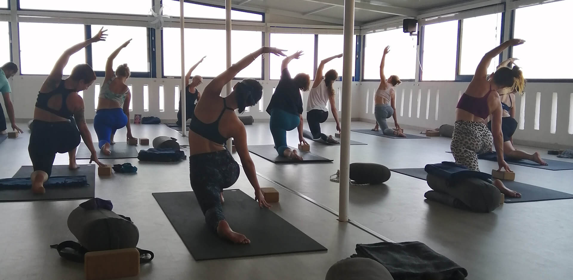 Lunge side stretch at Yoga Rocks Crete