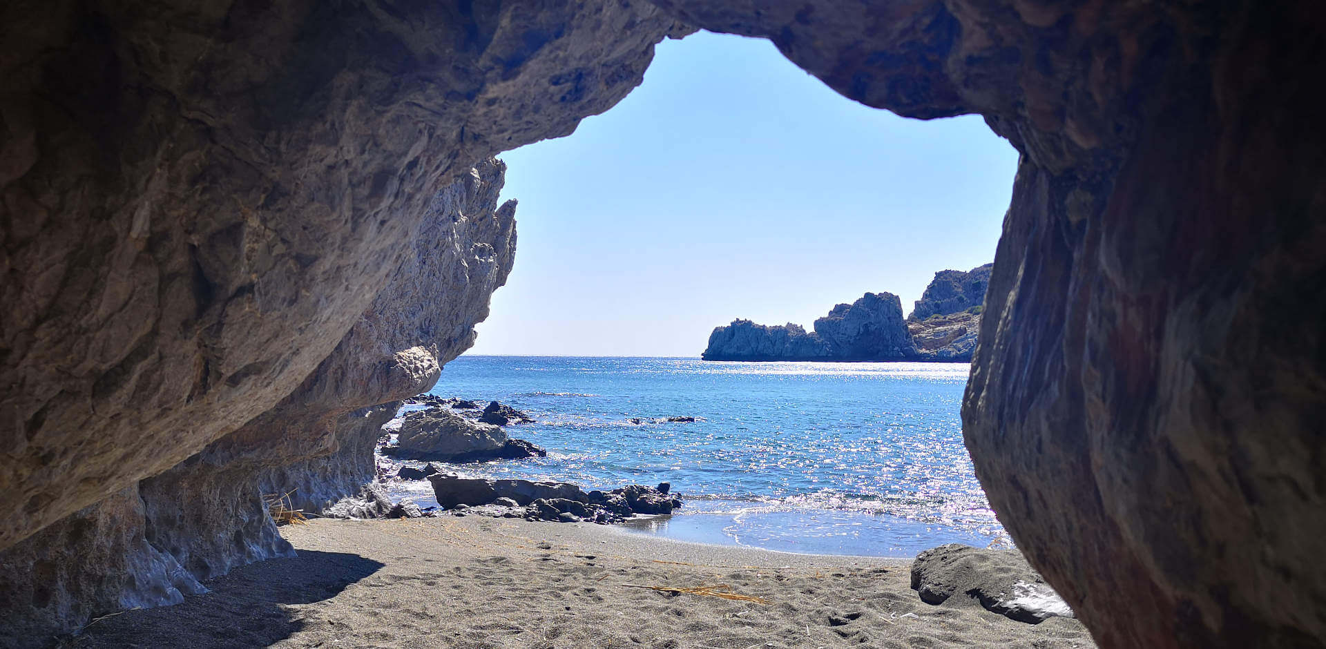The secret beach just below Yoga Rocks Crete looking out to the sleepy dragon