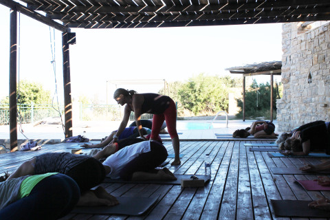 Balasana or childs pose on yoga holiday Crete