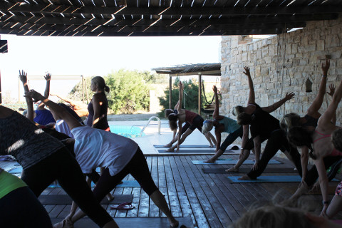 Trikonasana or triangle pose at Yoga Rocks Crete