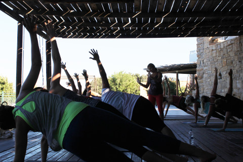 Vasisitasana with Coral Brown on yoga holiday