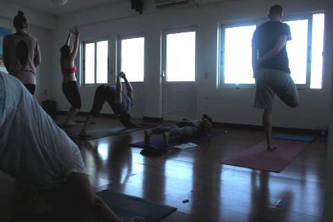 Ashtanga standing poses on yoga holiday in Greece