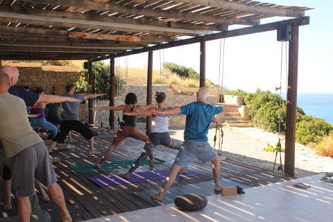 Virabhadrasana 2 on retreat at Yoga Rocks, Crete