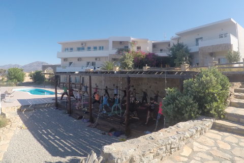 Asana practice on the yoga deck in Greece