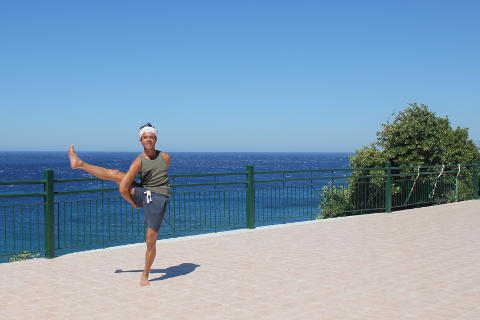 Bird of paradise pose with Shukram Das at Yoga Rocks