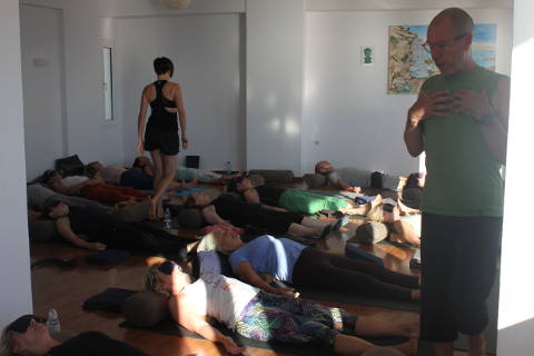 Norman's group in savasana at Yoga Rocks