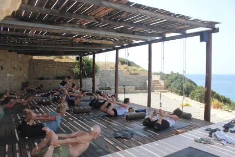 Dhanurasana with Josie Sykes on the Cretan deck