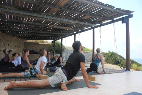 Eka pada raja kapotanasana on yoga holiday in Greece