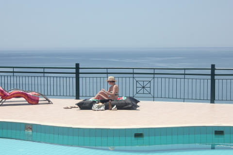 Relaxing by the pool at Yoga Rocks, Crete