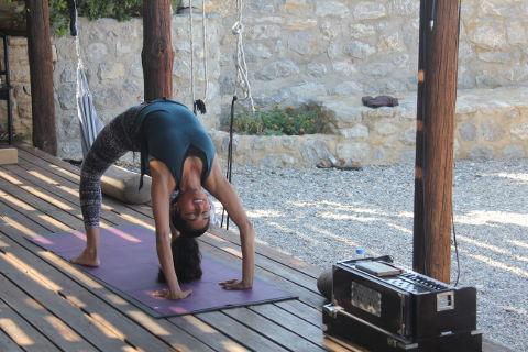 Reema Datta demonstrates urdvha dhanurasana on yoga holiday