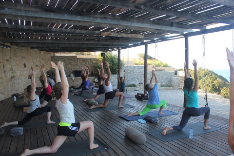 Reema Datta teaches lunge at Yoga Rocks Crete