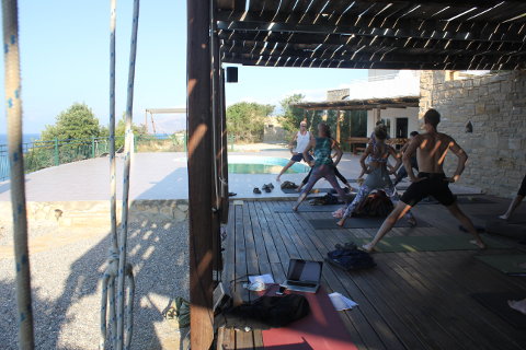 Prasarita padottanasana on yoga holiday in Crete