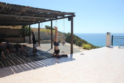 Salamba sirsasana on the deck at Yoga Rocks Crete