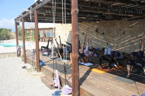 Setu bandhasana with sea view from yoga deck