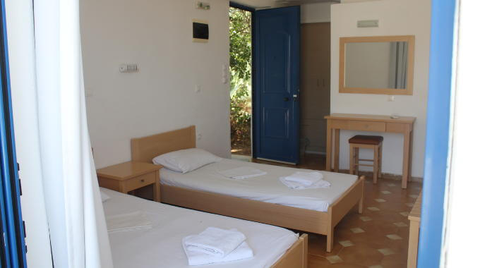 Ensuite rooms with sea view, fridge and air con at Yoga Rocks, Agios