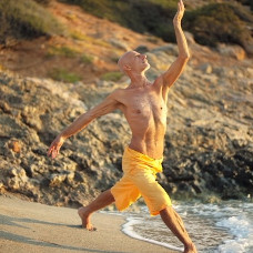Anastasis Koutsogiannis teaching a vinyasa flow yoga holiday at Yoga rocks retreat on Crete
