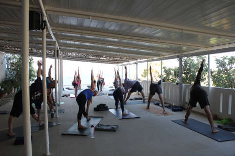 Yoga Rocks yoga terrace with David Williams teaching ashtanga