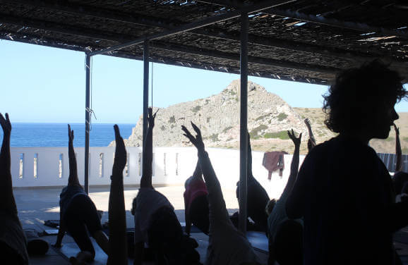 Side plank with variations with Josie Sykes on yoga holiday in Greece