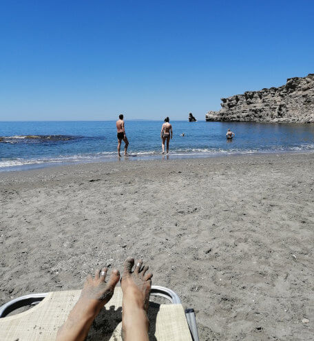 Agios Pavlos beach with sun loungers by yoga retreat