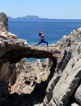 Reverse warrior on a yoga holiday in Agios Pavlos
