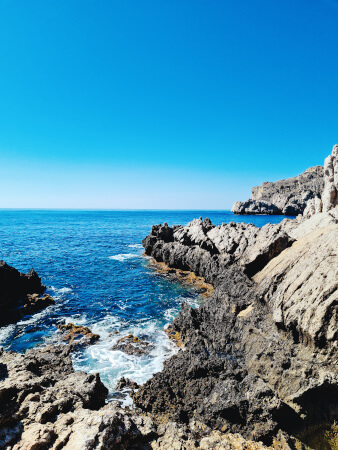 Gorgeous blue sky and fun rocky bays round the corner from Yoga Rocks