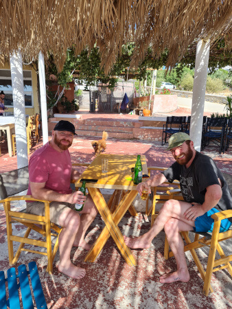 Sam and Ross on the terrace near the sea on yoga retreat