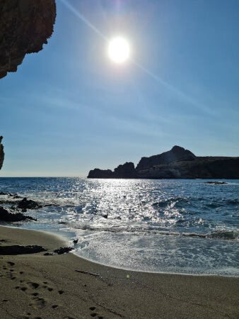 The sleepy dragon rock formation in Agios Pavlos bay